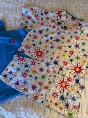 White & Blue Scrub Set With Multicolor Starburst Pattern